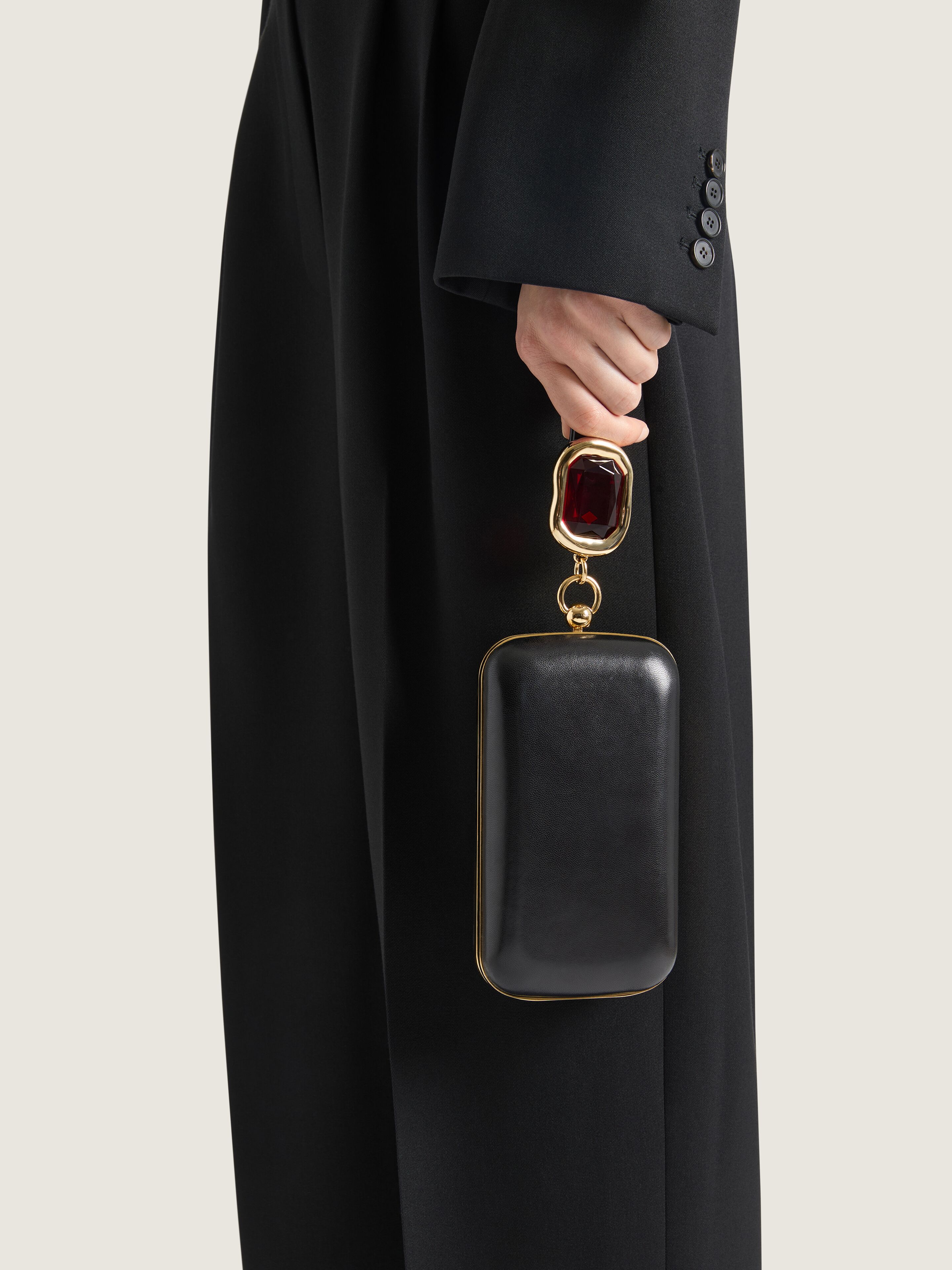 Evening clutch in nappa leather with crystal jewel